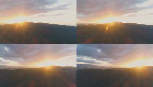 日落时山上的乌云最后的阳光照在山上高清在线视频素材下载