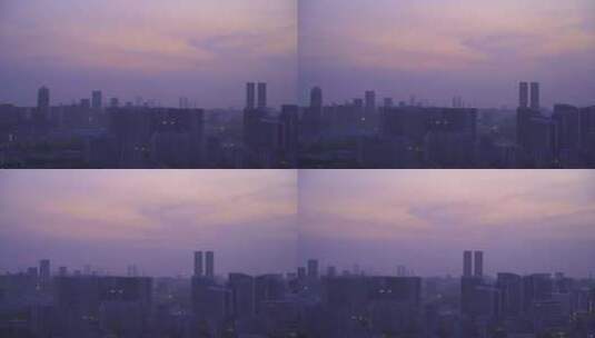 日出晨曦中的杭州滨江城市建筑风景航拍高清在线视频素材下载