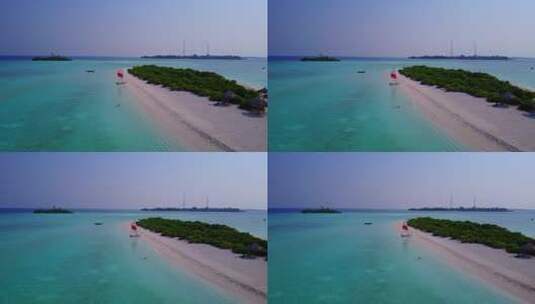 日间俯瞰沙滩白色天堂海滩和绿松石海背景的岛屿景观高清在线视频素材下载