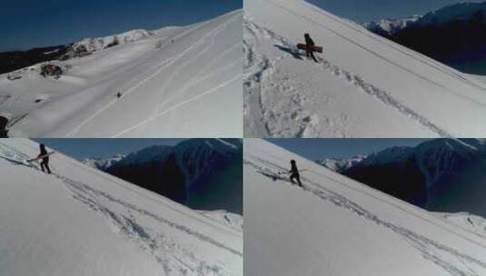 抱着滑雪板走在雪坡上的人高清在线视频素材下载