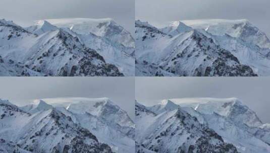 航拍新疆夏塔古道雪山帽子云高清在线视频素材下载