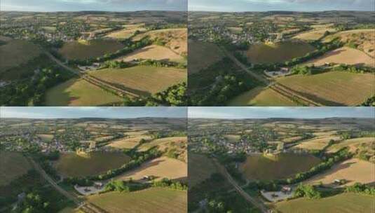 英国多塞特郡珀贝克郡科菲村和城堡的惊人鸟瞰图。高清在线视频素材下载