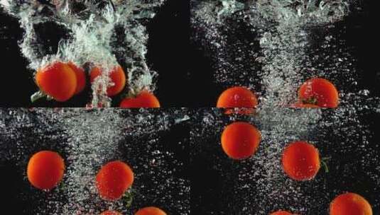 四个红色的番茄掉入水中慢镜头高清在线视频素材下载