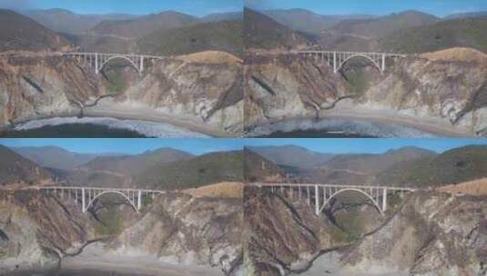 航拍两座山之间的大桥高清在线视频素材下载