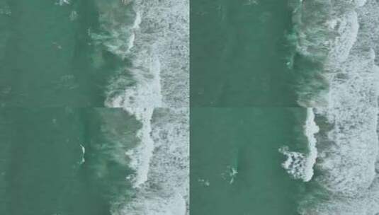 航拍泰国普吉岛海面波浪冲刷沙滩特写高清在线视频素材下载