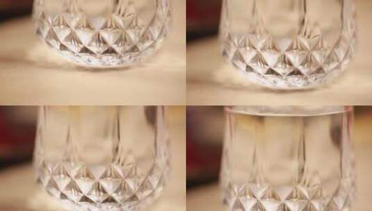 玻璃杯里的清水白酒高清在线视频素材下载
