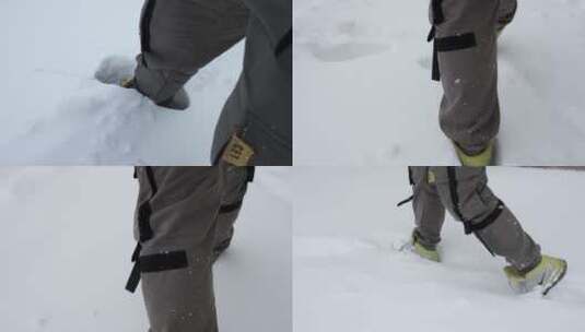 摸过膝盖的雪地上行走踏雪前行高清在线视频素材下载