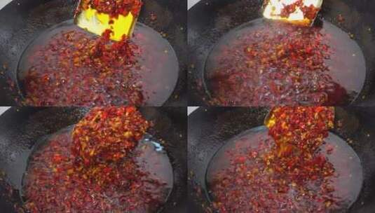 锅里熬制美味辣椒酱4k美食制作实拍高清在线视频素材下载