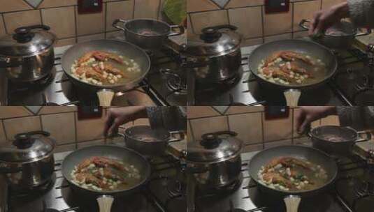 将香菜撒在煮虾的锅里高清在线视频素材下载