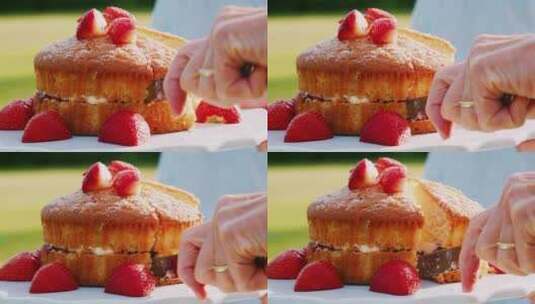 切草莓海绵蛋糕片的女人特写高清在线视频素材下载