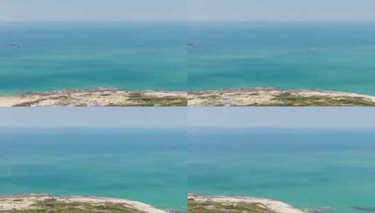 航拍一望无际蓝色海洋竖屏高清在线视频素材下载