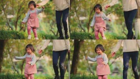 母亲和宝宝快乐玩耍公园里奔跑高清在线视频素材下载