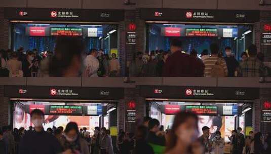 夜晚杭州龙翔桥地铁站出入口的人流高清在线视频素材下载