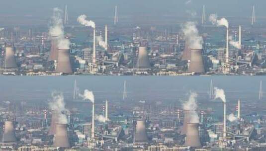 航拍武汉环保化工工业园区工厂冒烟的烟囱高清在线视频素材下载
