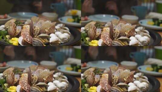 高清4k实拍一锅海鲜热气顾客贝壳美食扇贝高清在线视频素材下载