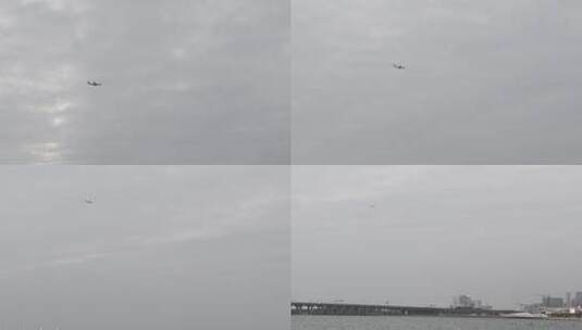 阴天空中飞机飞过高清在线视频素材下载