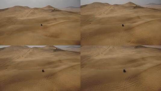 航拍沙漠中的越野卡车高清在线视频素材下载