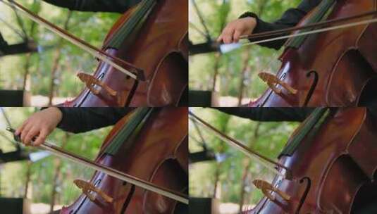 女性手工演奏大提琴管弦乐队音乐家户外乐器高清在线视频素材下载