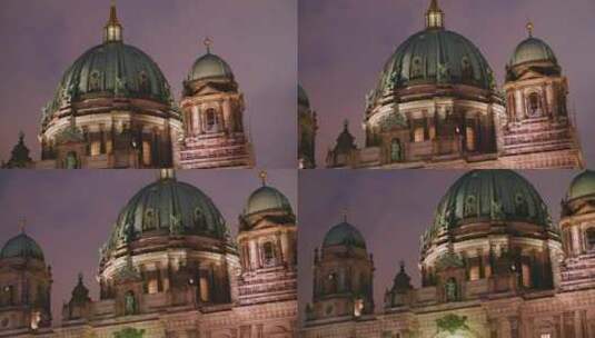 夜晚柏林大教堂的特写。照亮的多云天空和飞高清在线视频素材下载