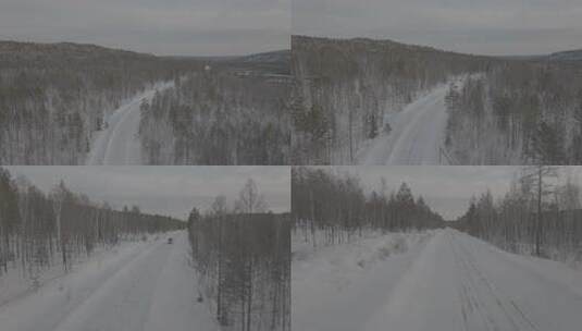 行驶在冰雪道路的汽车高清在线视频素材下载