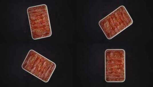 4K一盘旋转的火锅食材肉片展示高清在线视频素材下载