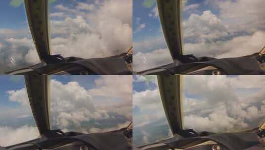 飞行员驾驶飞机在云层穿越高清在线视频素材下载
