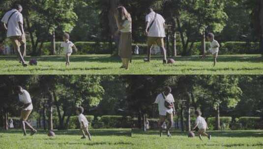 在公园踢球的家庭高清在线视频素材下载