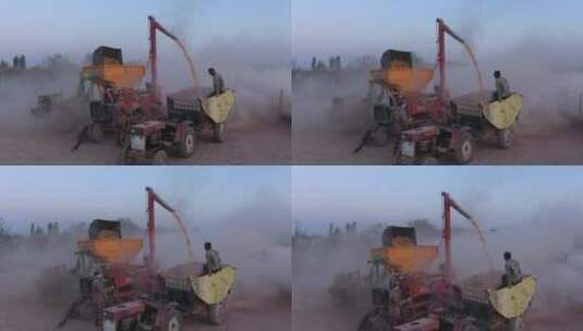 农民操作玉米脱粒机高清在线视频素材下载