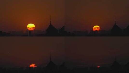 黄昏夕阳红日落日与城市建筑剪影高清在线视频素材下载
