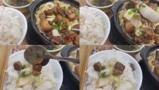 热气腾腾米饭砂锅台式卤肉饭勺子乘肉高清在线视频素材下载