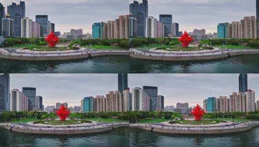 青岛五四广场航拍五月的风雕塑高清在线视频素材下载