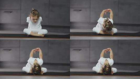 小女孩瑜伽垫上练习瑜伽高清在线视频素材下载