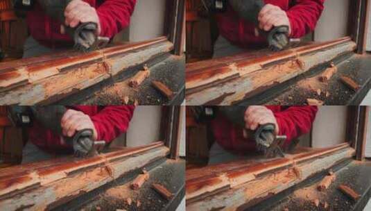 工人正在拆除旧木窗框高清在线视频素材下载