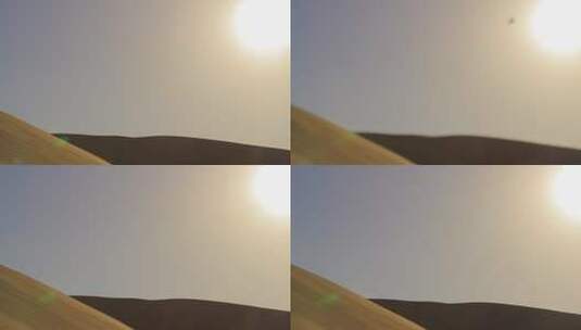 日照沙漠前景人物走过高清在线视频素材下载