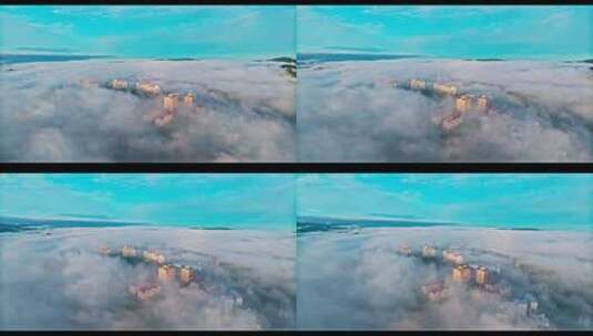 航拍云雾中的城市建筑高清在线视频素材下载