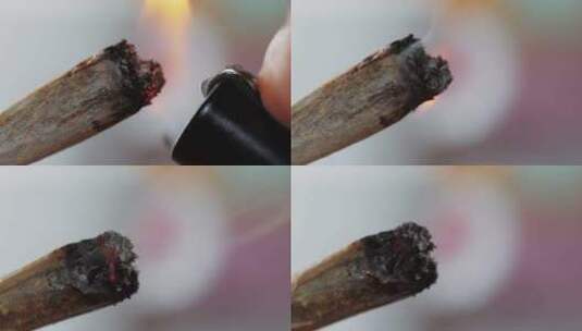 妇女在家点燃大麻关节的特写镜头中央商务区医用大麻杂草与高清在线视频素材下载