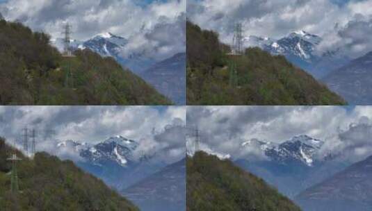 阿尔卑斯山山顶上的电力线塔，风景秀丽的尖山背景高清在线视频素材下载