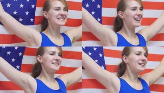 美国年轻女子手持美国国旗庆祝高清在线视频素材下载