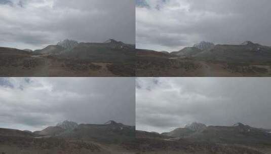 高原阴天的雪山高清在线视频素材下载