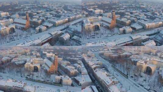 冬季城市的铁路。火车在克拉科夫的雪轨上行高清在线视频素材下载