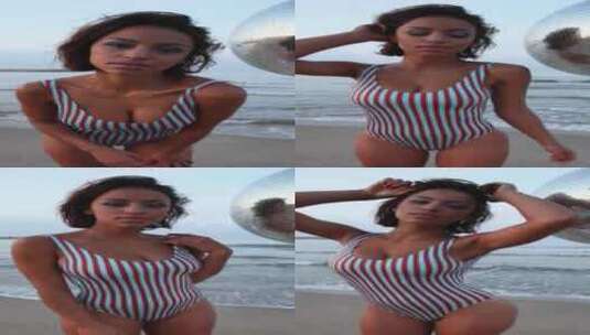 女性舞者在海滩上的垂直格式高清在线视频素材下载