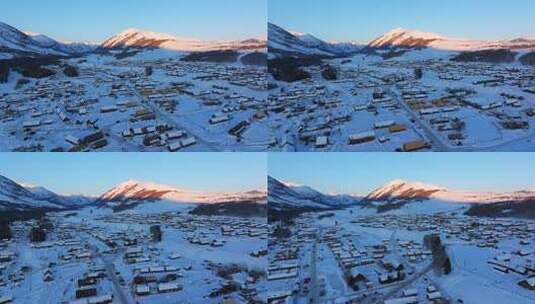 新疆阿勒泰地区禾木村雪景航拍高清在线视频素材下载