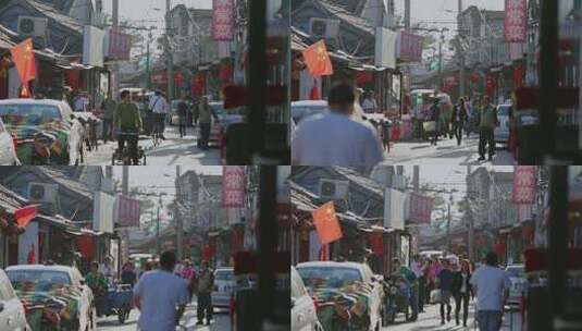北京胡同繁忙街道上的行人与车辆高清在线视频素材下载