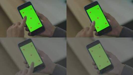 男人手上的手机屏幕手机绿幕高清在线视频素材下载