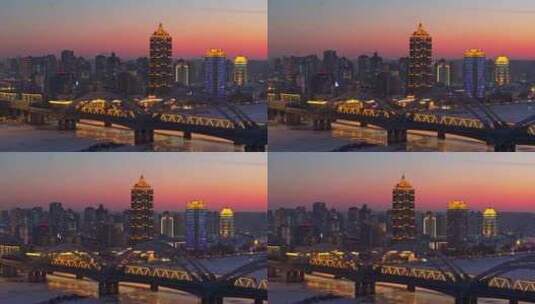 中国黑龙江哈尔滨松花江滨洲铁路桥夜景航拍高清在线视频素材下载