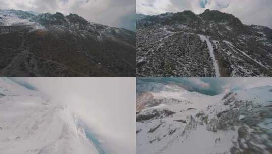 航拍山峰山顶高山雪山穿越机航拍雪山高清在线视频素材下载