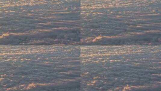 4k飞机上拍到日出的云层高清在线视频素材下载
