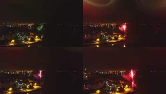 滨海城市夜晚海岸边燃放烟花爆竹1高清在线视频素材下载