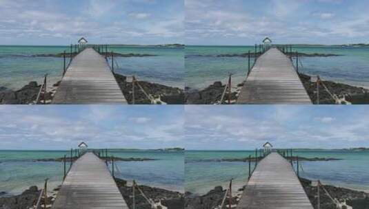 连接岩岸和小岛的木板桥高清在线视频素材下载