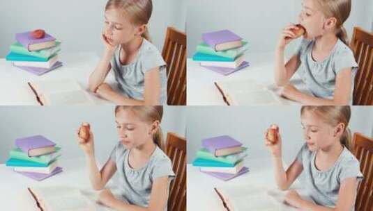 女孩边读书边吃水果高清在线视频素材下载
